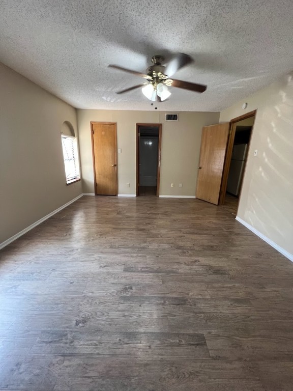 3506 Speedway, Unit 101 Austin, TX 78705 - Photo 29 of 31 wooden floor in an empty room with a window