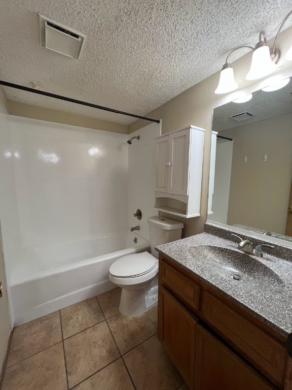 3506 Speedway, Unit 101 Austin, TX 78705 - Photo 30 of 31 a bathroom with a granite countertop sink mirror vanity and toilet