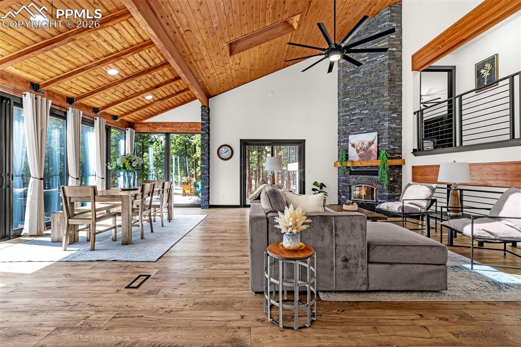 15520 Bar X Road Colorado Springs, CO 80908 - Photo 13 of 50 a living room filled with furniture
