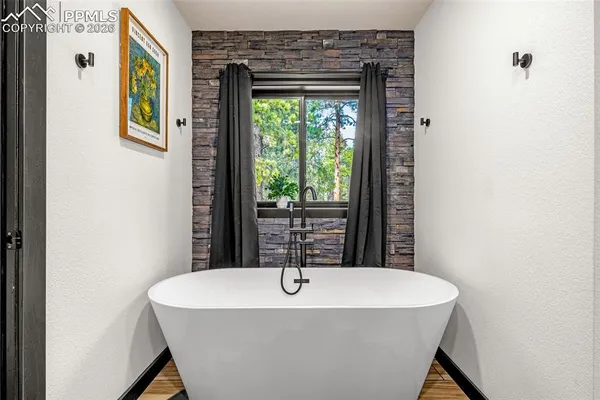 a bathroom with a double vanity sink mirror and double