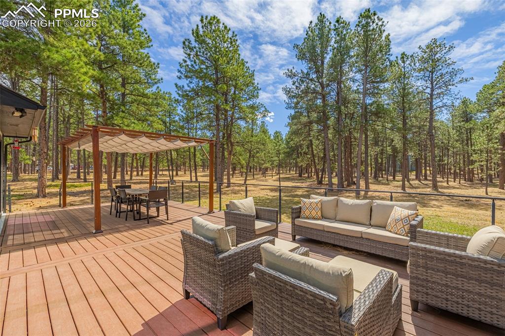 15520 Bar X Road Colorado Springs, CO 80908 - Photo 3 of 50 a view of outdoor space with seating