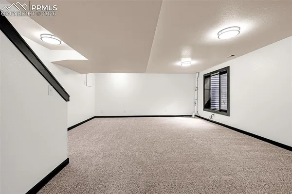 a view of an empty walk in closet
