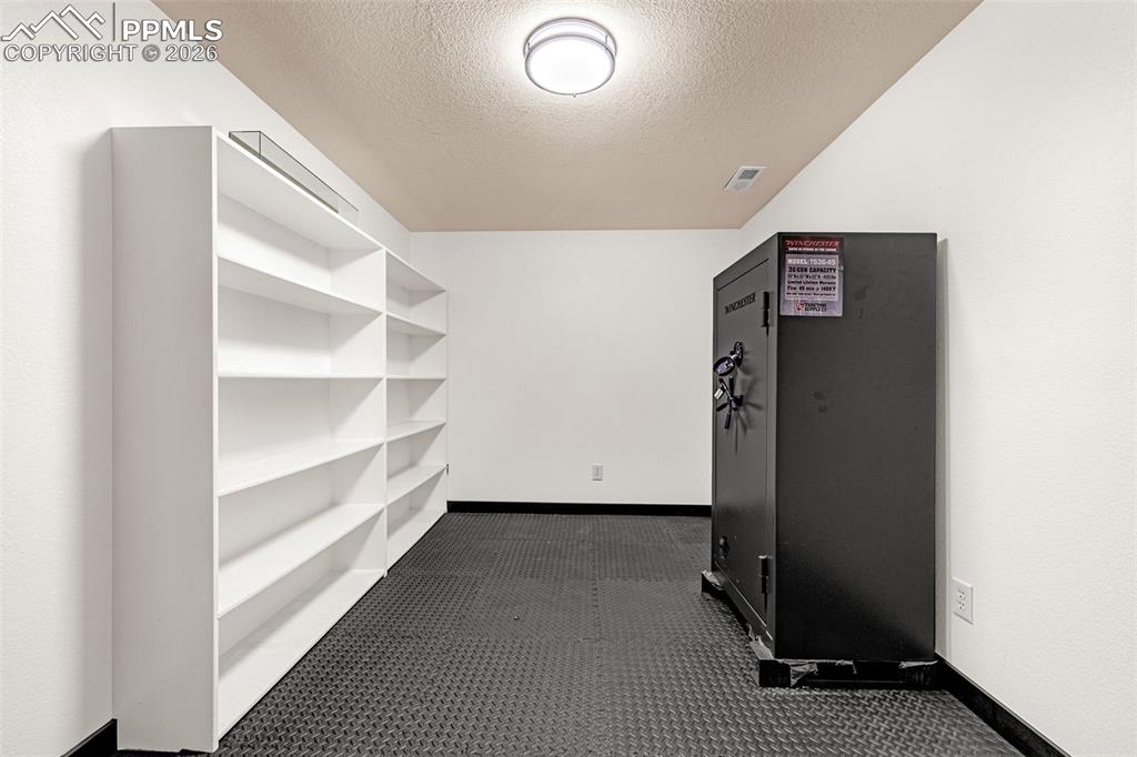 15520 Bar X Road Colorado Springs, CO 80908 - Photo 37 of 50 a view of an empty walk in closet