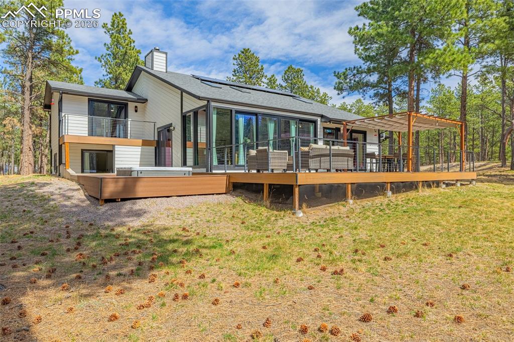 15520 Bar X Road Colorado Springs, CO 80908 - Photo 40 of 50 front view of a house with a yard
