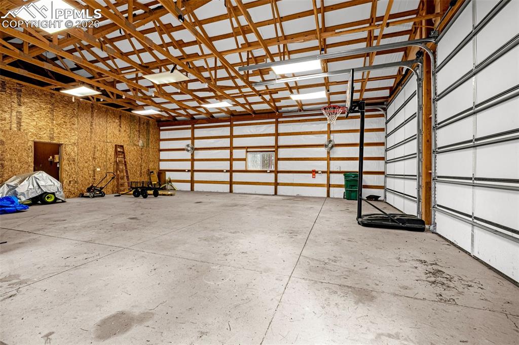 15520 Bar X Road Colorado Springs, CO 80908 - Photo 45 of 50 a view of a room with furniture