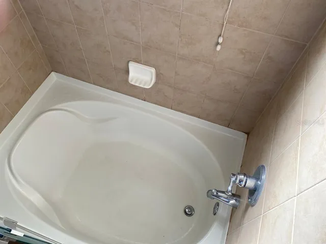 a bathroom with a bathtub