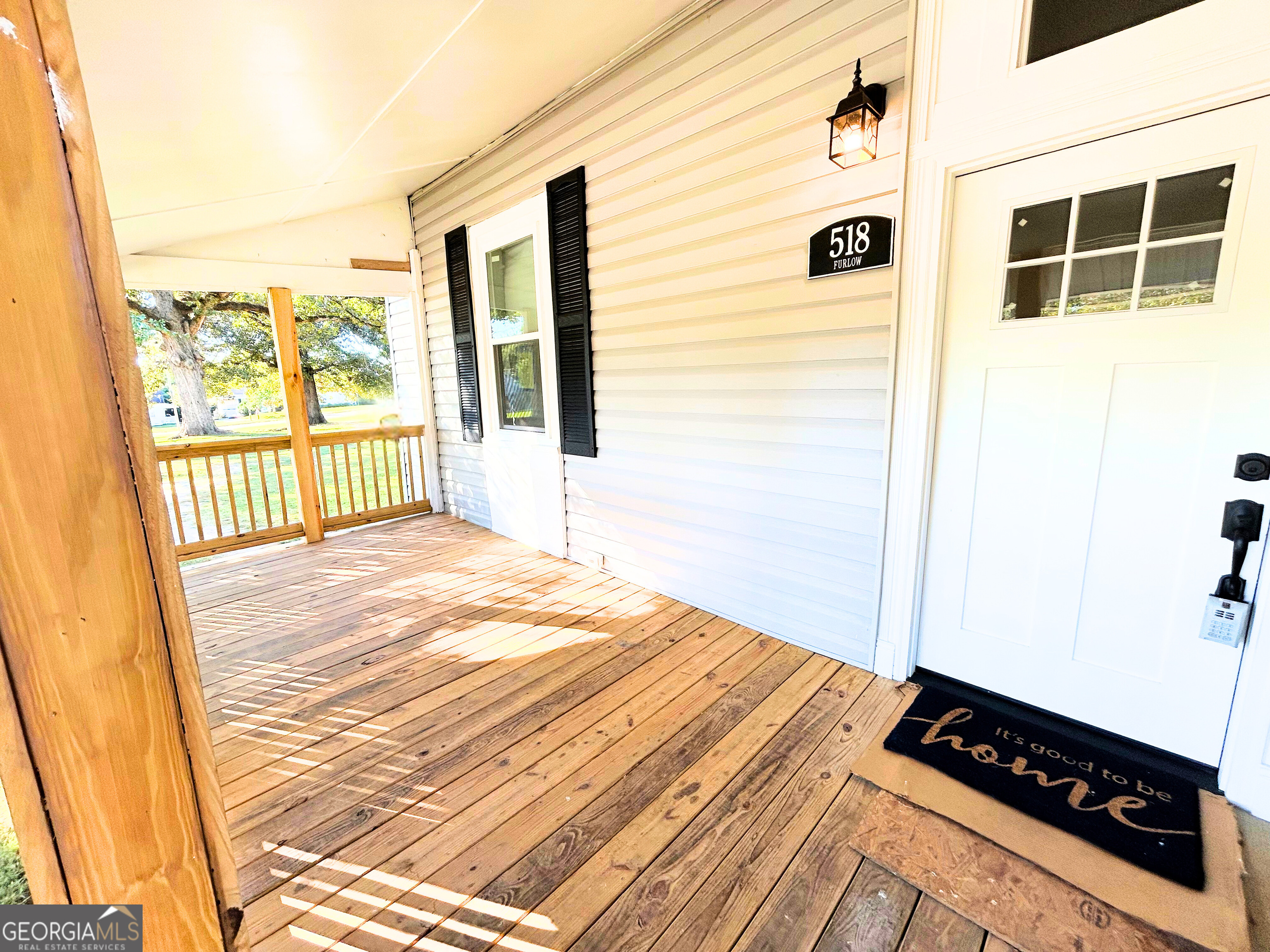 518 East Furlow Street Americus, GA 31709 - Photo 4 of 28 a bedroom with a bed and a window