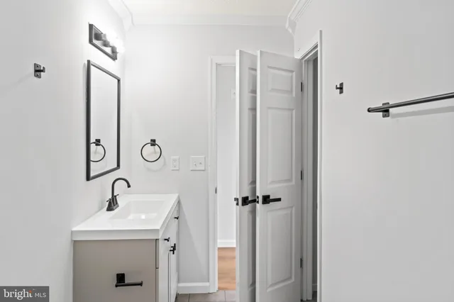 an aerial view of a house with a lake view