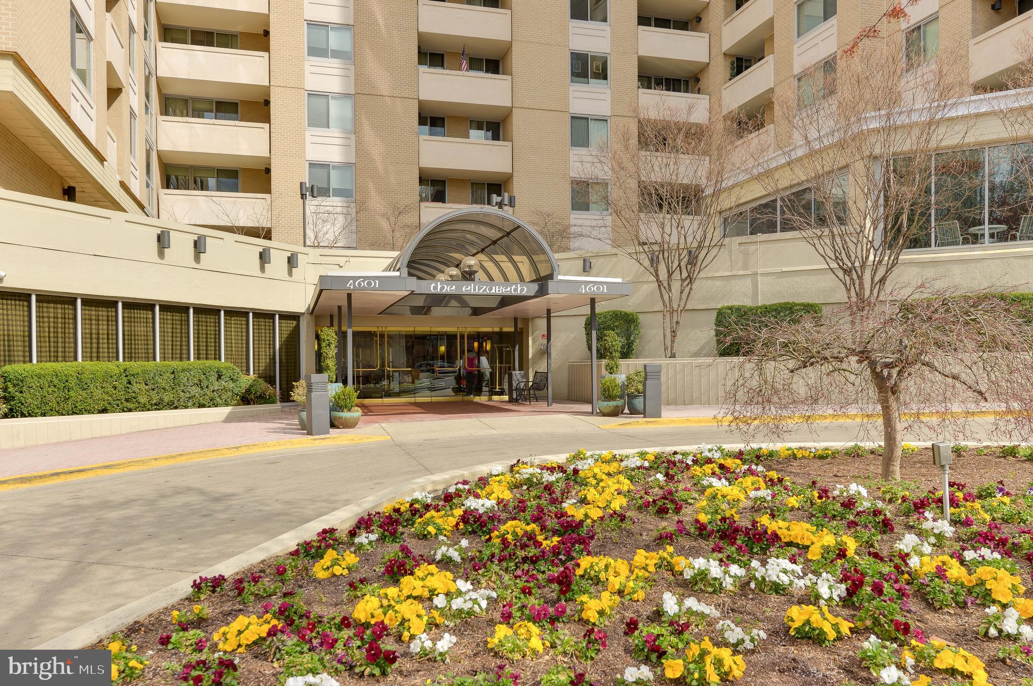 4601 North Park Avenue, Unit 1118 Chevy Chase, MD 20815 - Photo 2 of 30 a front view of a building with street