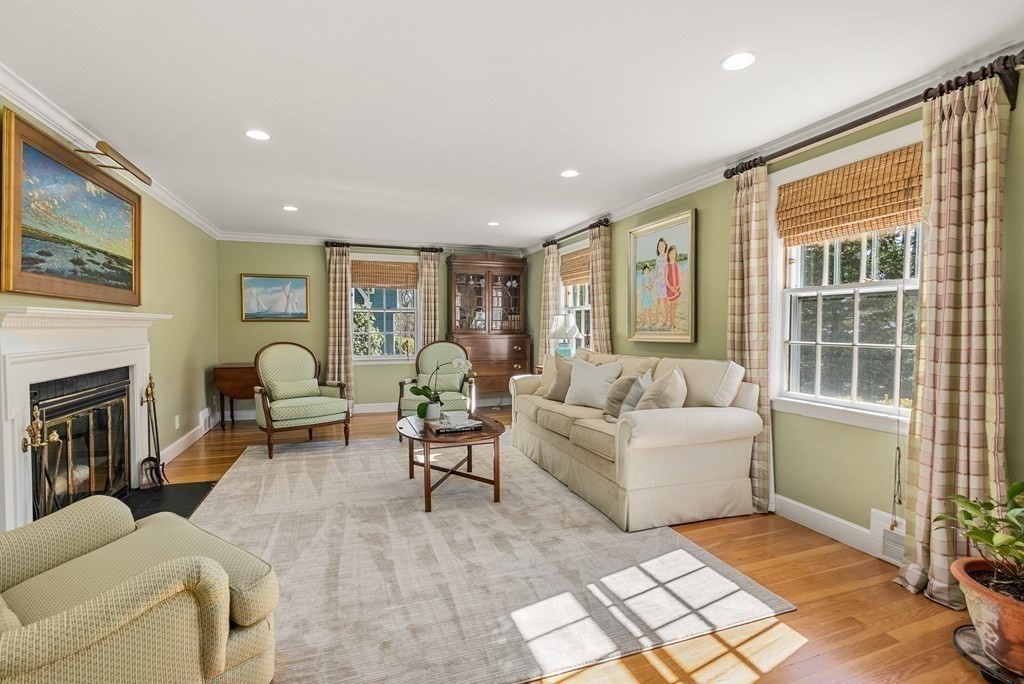 10 Meadowbrook Road Wellesley, MA 02481 - Photo 15 of 40 a living room with furniture a fireplace and a table
