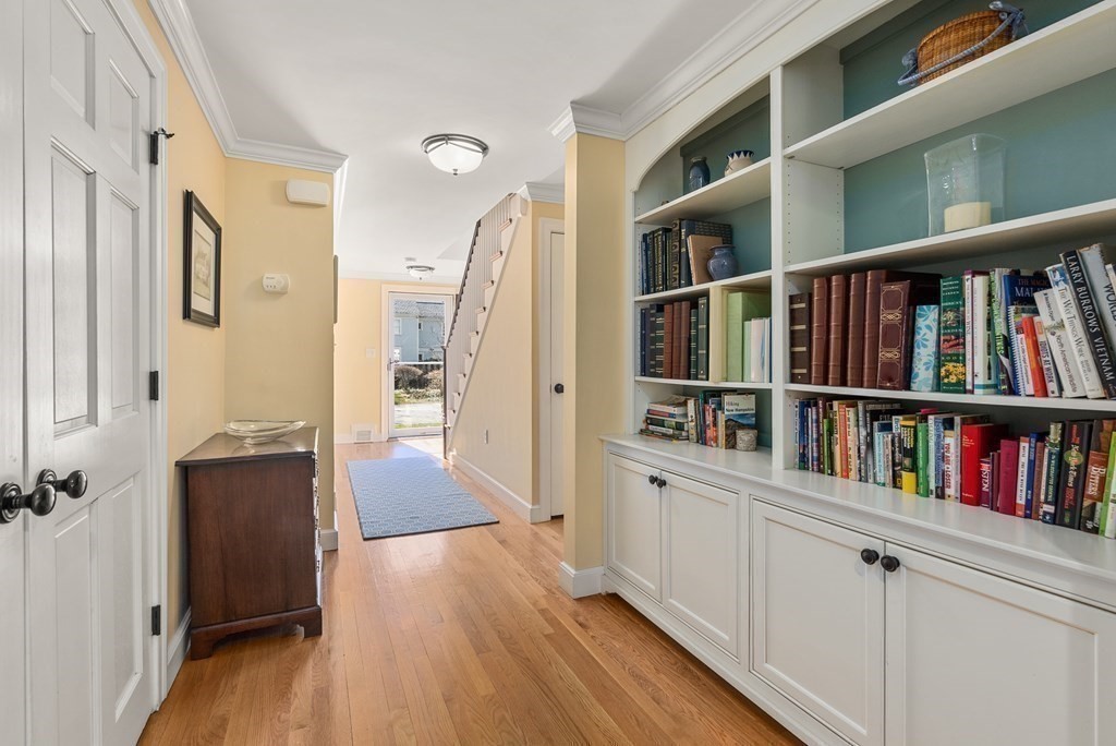 10 Meadowbrook Road Wellesley, MA 02481 - Photo 17 of 40 a view of walk in closet with clothes and shoes