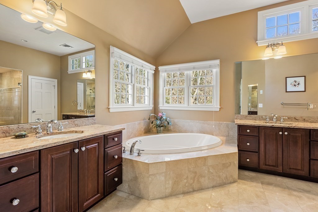 10 Meadowbrook Road Wellesley, MA 02481 - Photo 23 of 40 a spacious bathroom with a tub sink and mirror