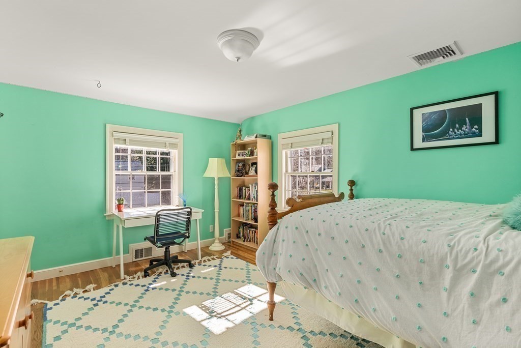 10 Meadowbrook Road Wellesley, MA 02481 - Photo 24 of 40 a bedroom with furniture and a window
