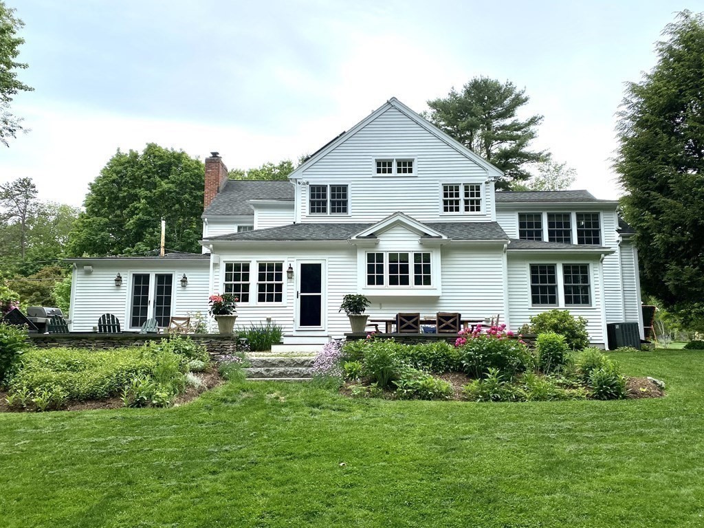 10 Meadowbrook Road Wellesley, MA 02481 - Photo 31 of 40 a front view of house with yard and green space