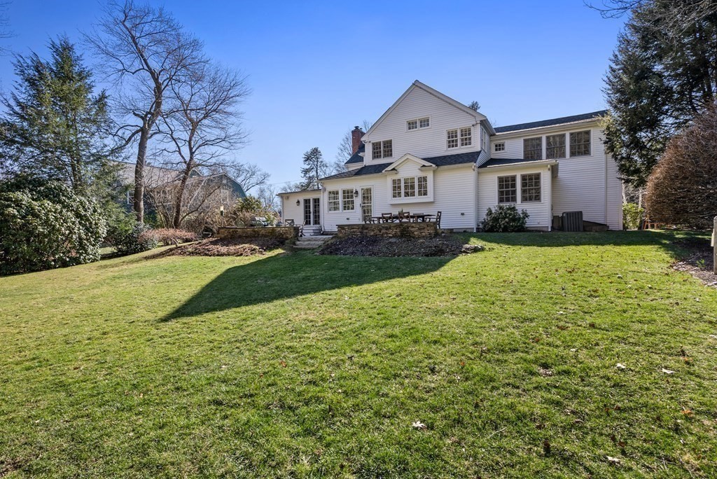 10 Meadowbrook Road Wellesley, MA 02481 - Photo 34 of 40 a view of a house with a big yard and large trees