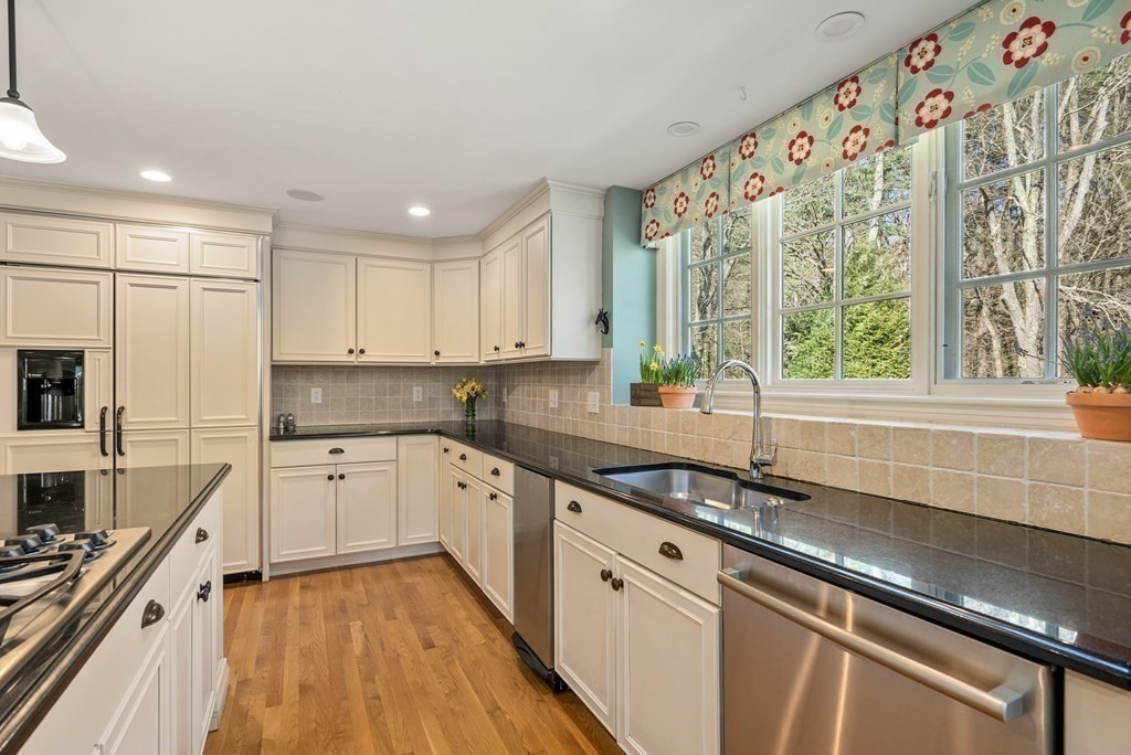 10 Meadowbrook Road Wellesley, MA 02481 - Photo 10 of 40 a kitchen with a sink stove and cabinets
