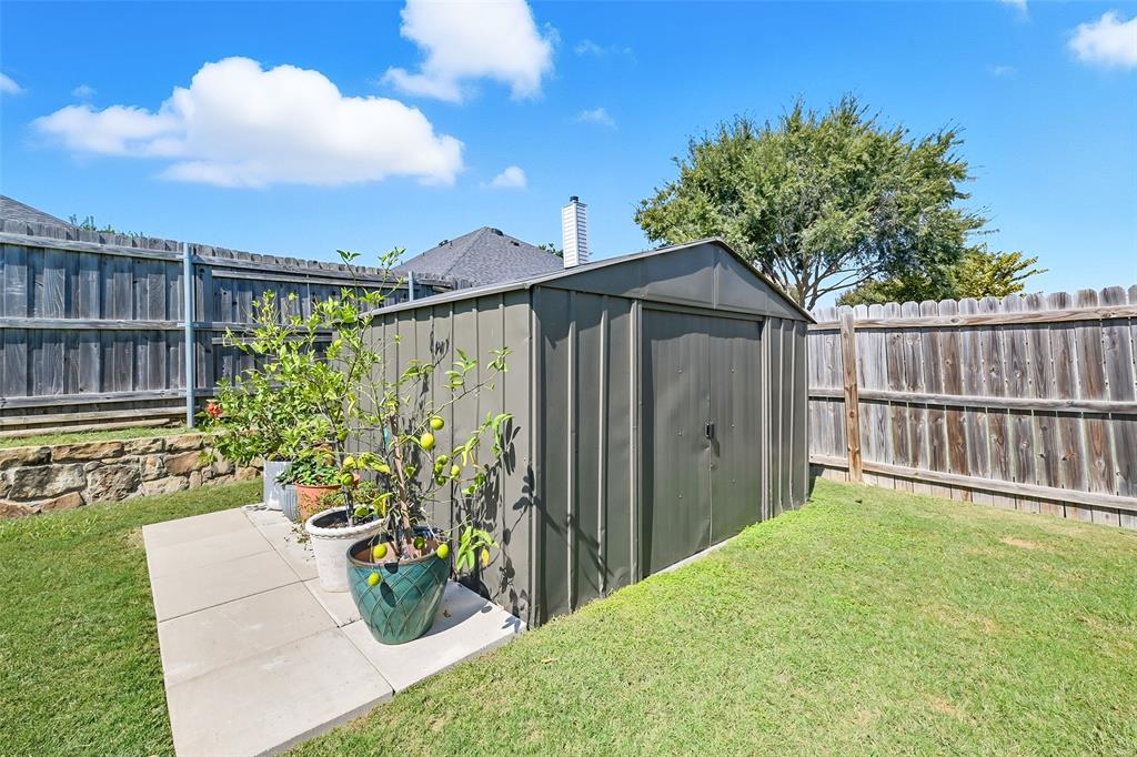308 Sheridan Road Oak Point, TX 75068 - Photo 26 of 32 View of freshly painted shed to store all of your outdoor tools
