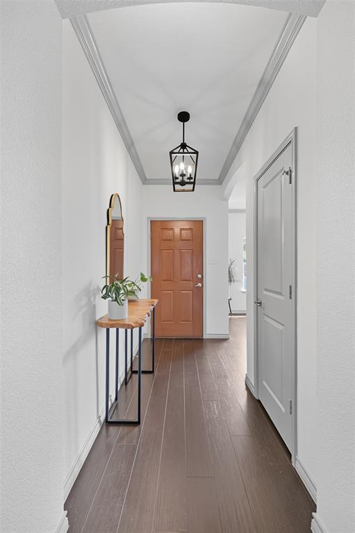 308 Sheridan Road Oak Point, TX 75068 - Photo 5 of 32 Corridor with ornamental molding, and arched walkways