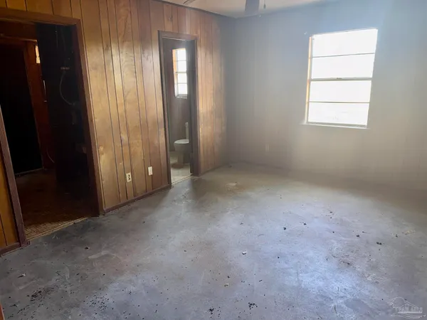 an empty room with windows