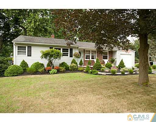 29 Orchard Road Middlesex, NJ 08846 - Photo 1 of 25 a view of a house with backyard sitting area and garden