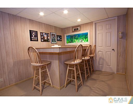 29 Orchard Road Middlesex, NJ 08846 - Photo 14 of 25 a dining room with furniture and window
