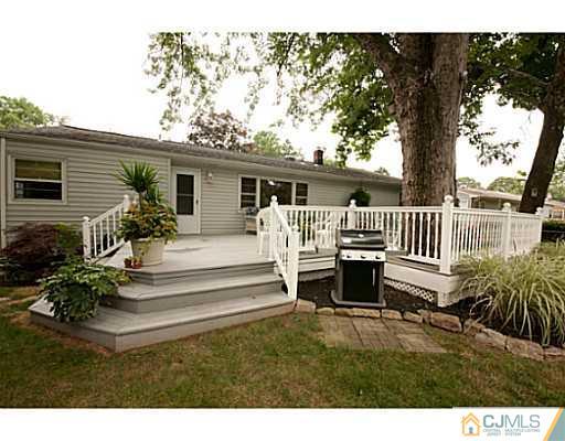 29 Orchard Road Middlesex, NJ 08846 - Photo 21 of 25 a view of a house with backyard and sitting area