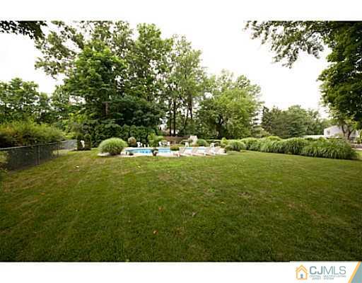 29 Orchard Road Middlesex, NJ 08846 - Photo 23 of 25 a view of yard with green space