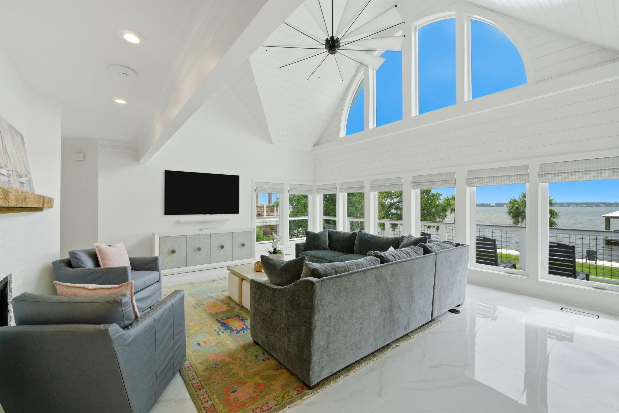 31061 Peninsula Drive Orange Beach, AL 36561 - Photo 38 of 93 a living room with furniture and a flat screen tv