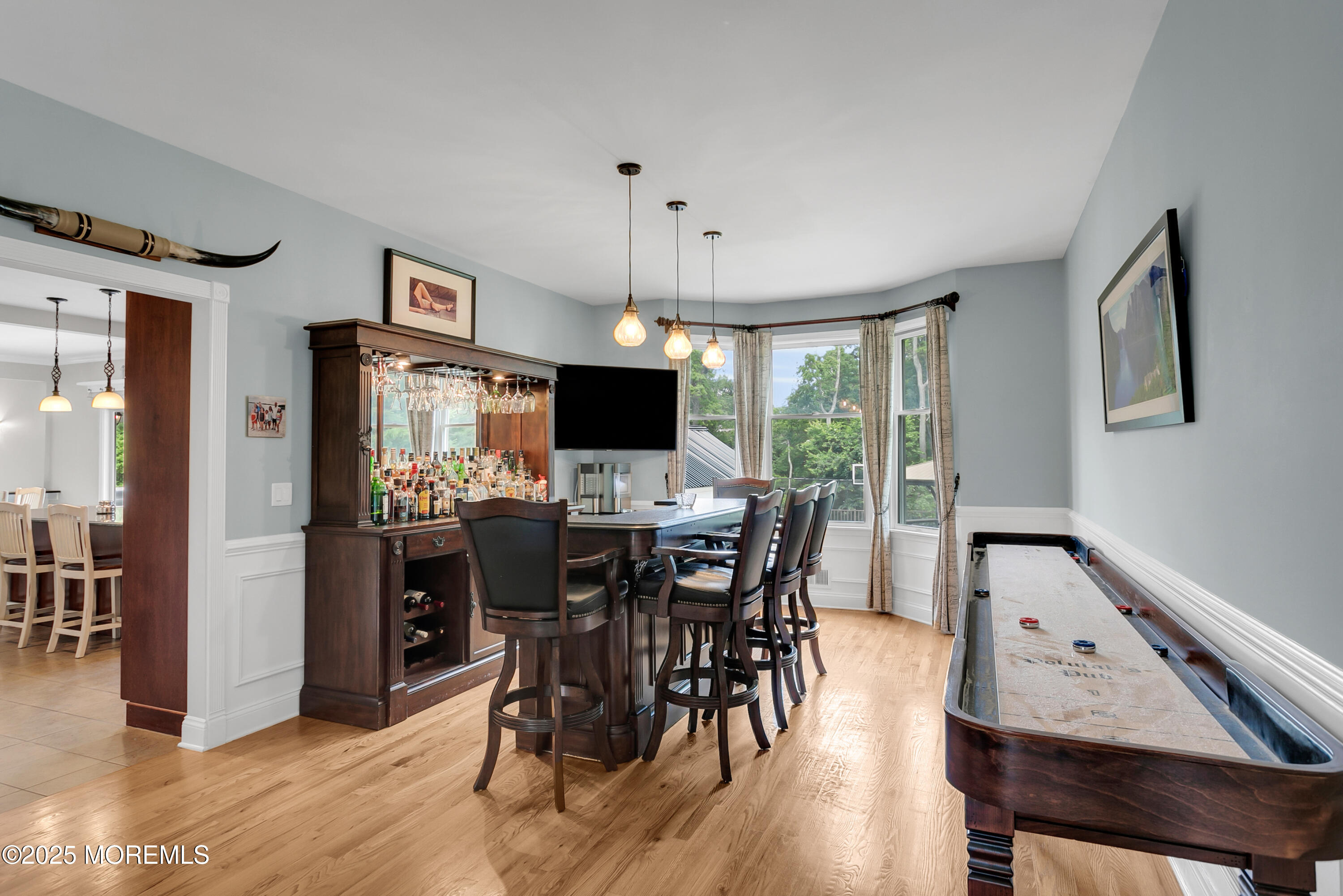 529 Woodview Road Toms River, NJ 08755 - Photo 18 of 85 a view of a dining room with furniture window and wooden floor