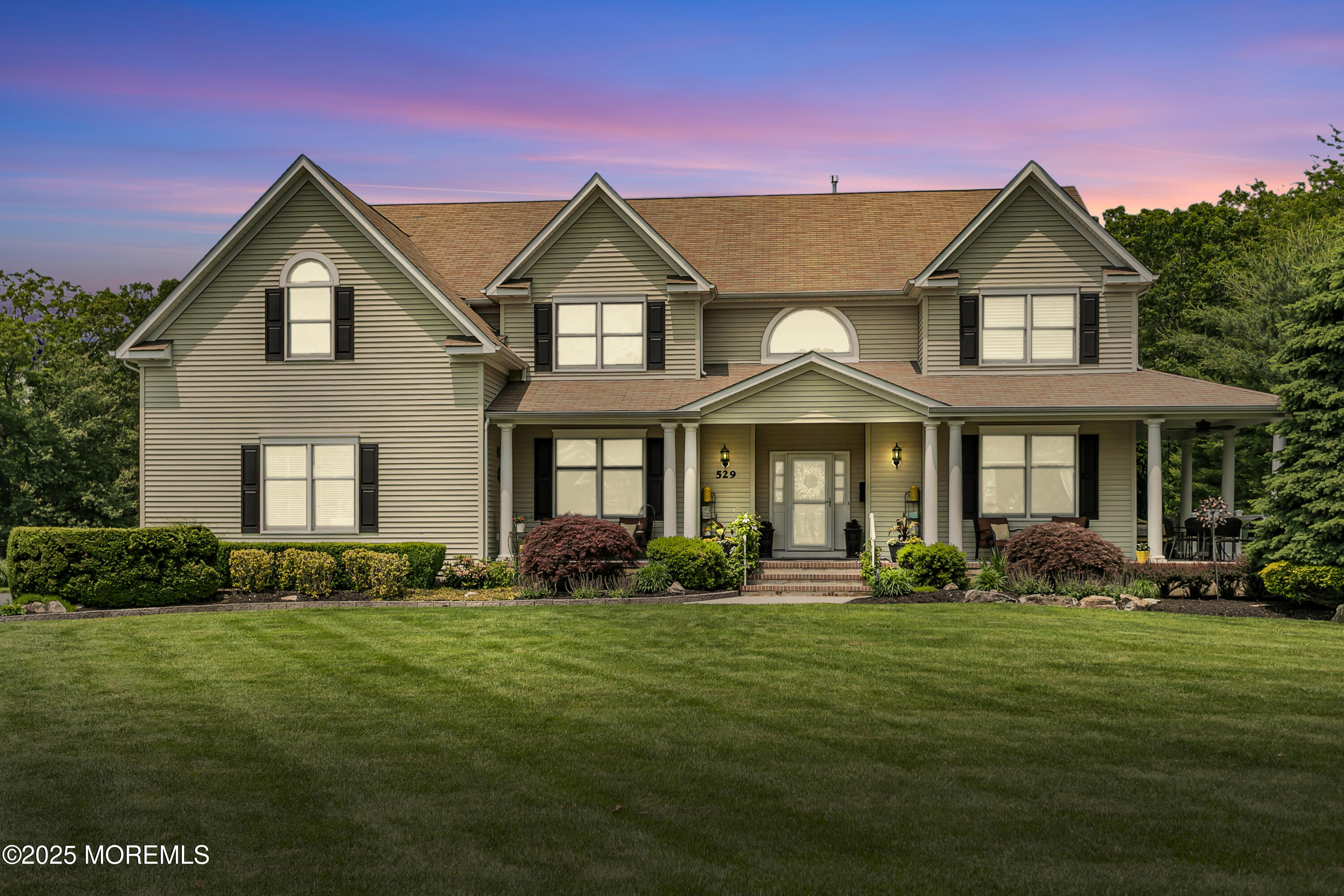 529 Woodview Road Toms River, NJ 08755 - Photo 2 of 85 a front view of a house with a yard