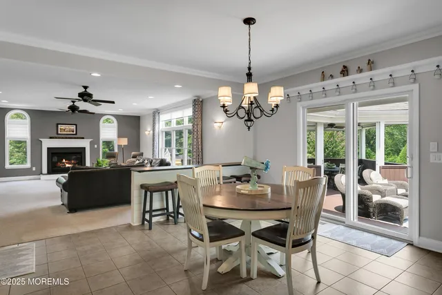 a bath tub sitting in a bathroom next to a window