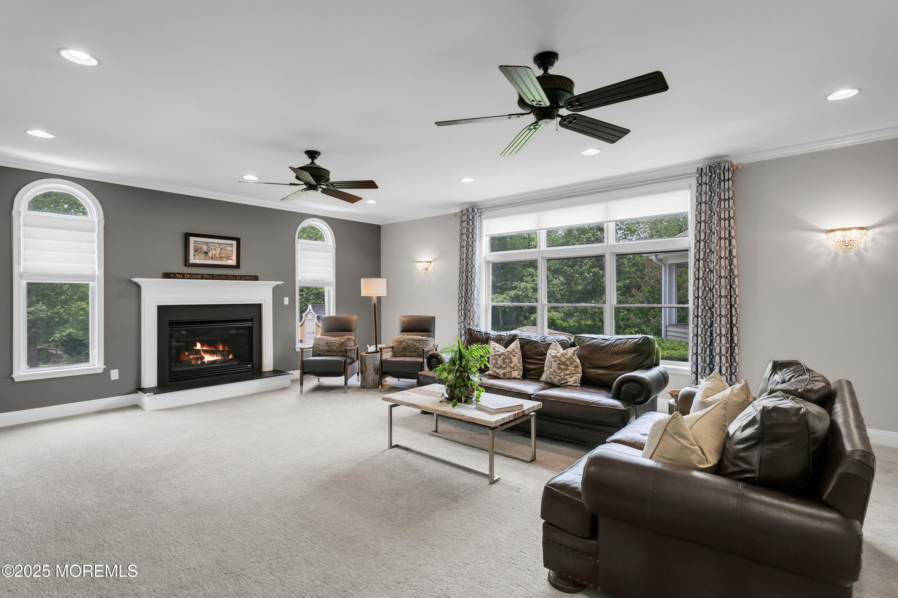 529 Woodview Road Toms River, NJ 08755 - Photo 25 of 85 a living room with furniture and a fireplace