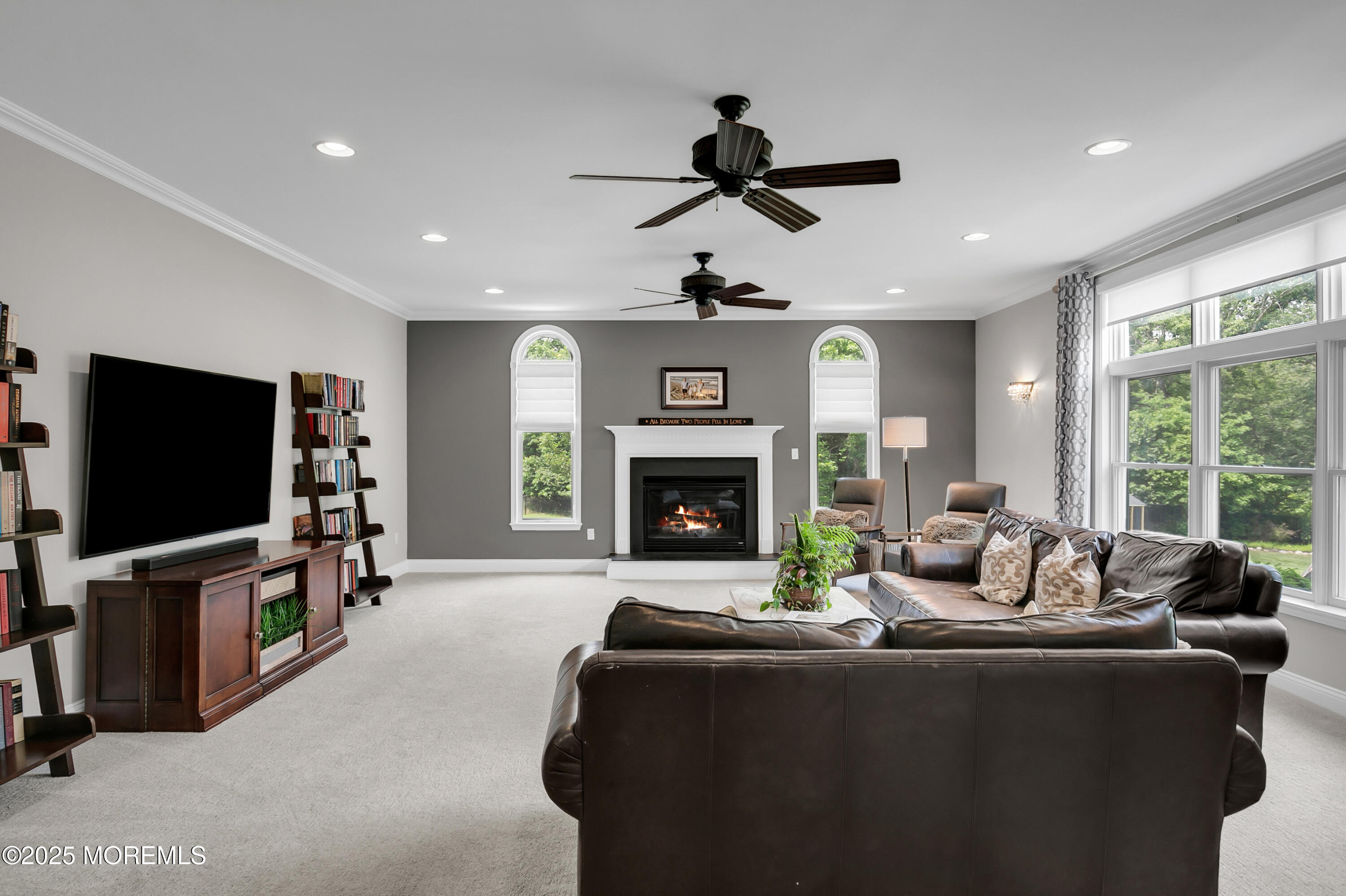 529 Woodview Road Toms River, NJ 08755 - Photo 26 of 85 a living room with furniture and a flat screen tv