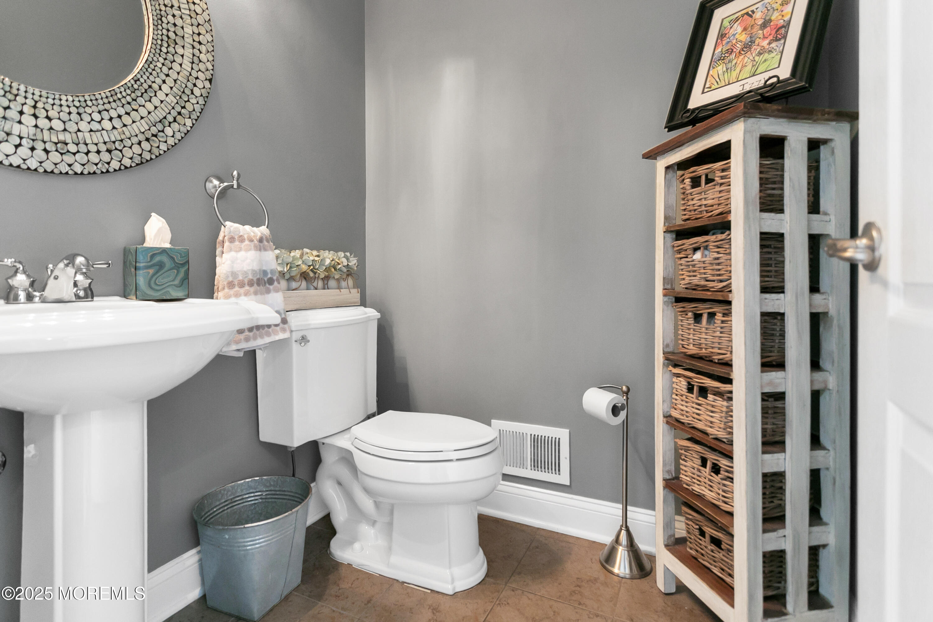 529 Woodview Road Toms River, NJ 08755 - Photo 28 of 85 a bathroom with a toilet a sink and a mirror
