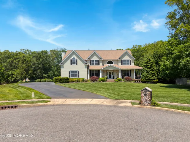 a view of a house with a big yard