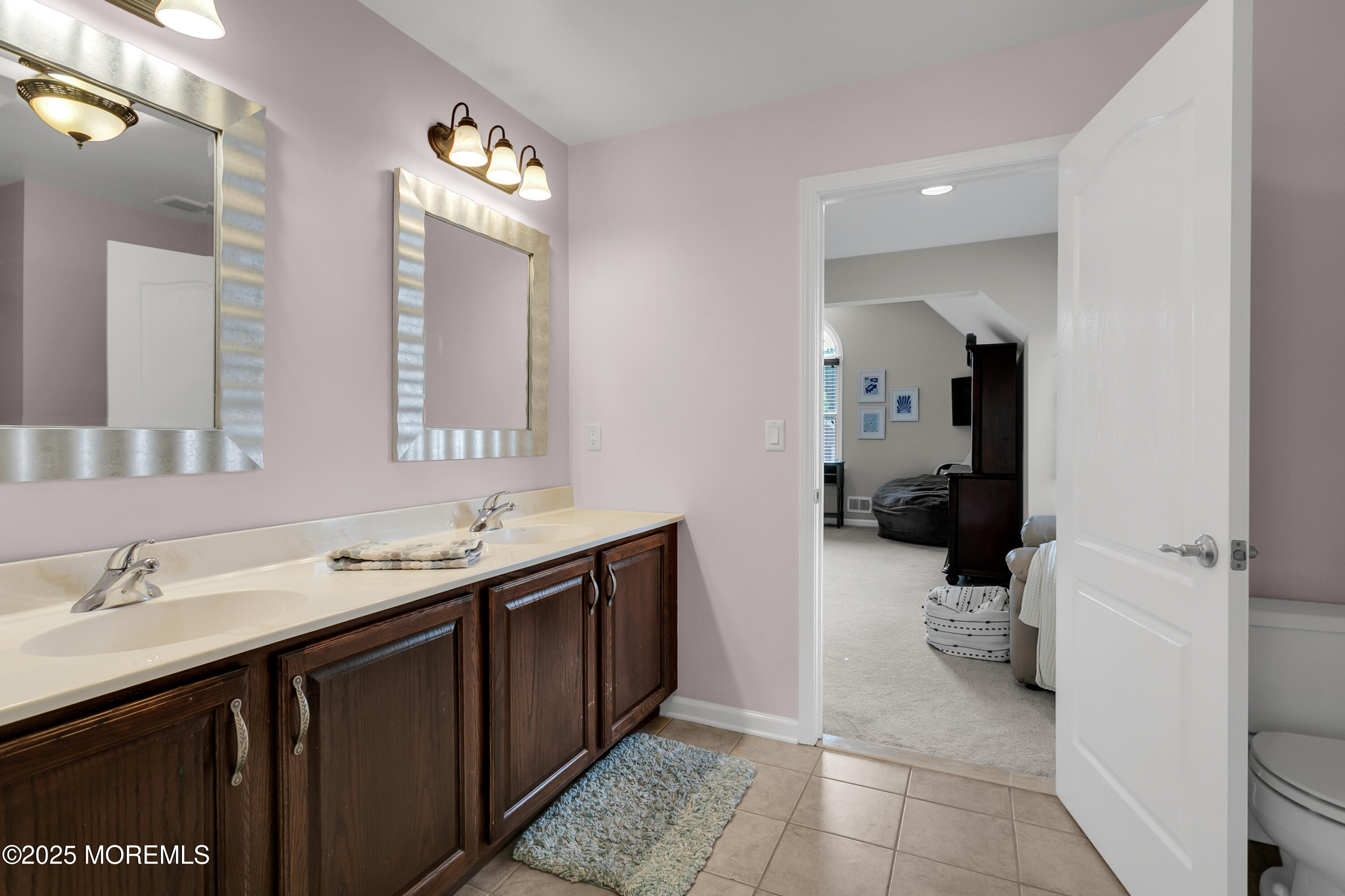 529 Woodview Road Toms River, NJ 08755 - Photo 42 of 85 a spacious bathroom with a double vanity sink and a mirror