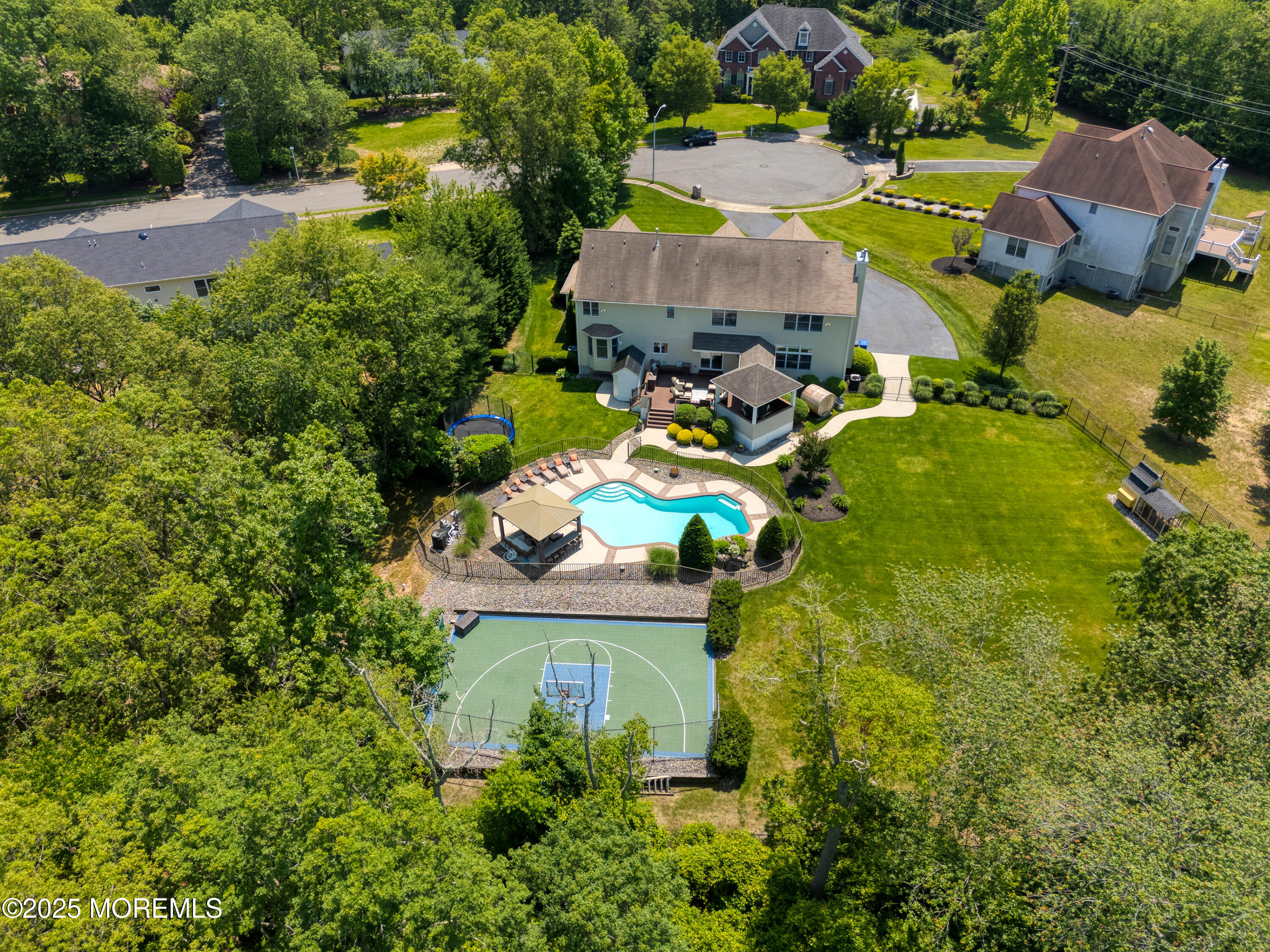 529 Woodview Road Toms River, NJ 08755 - Photo 6 of 85 an aerial view of a house with a garden and yard