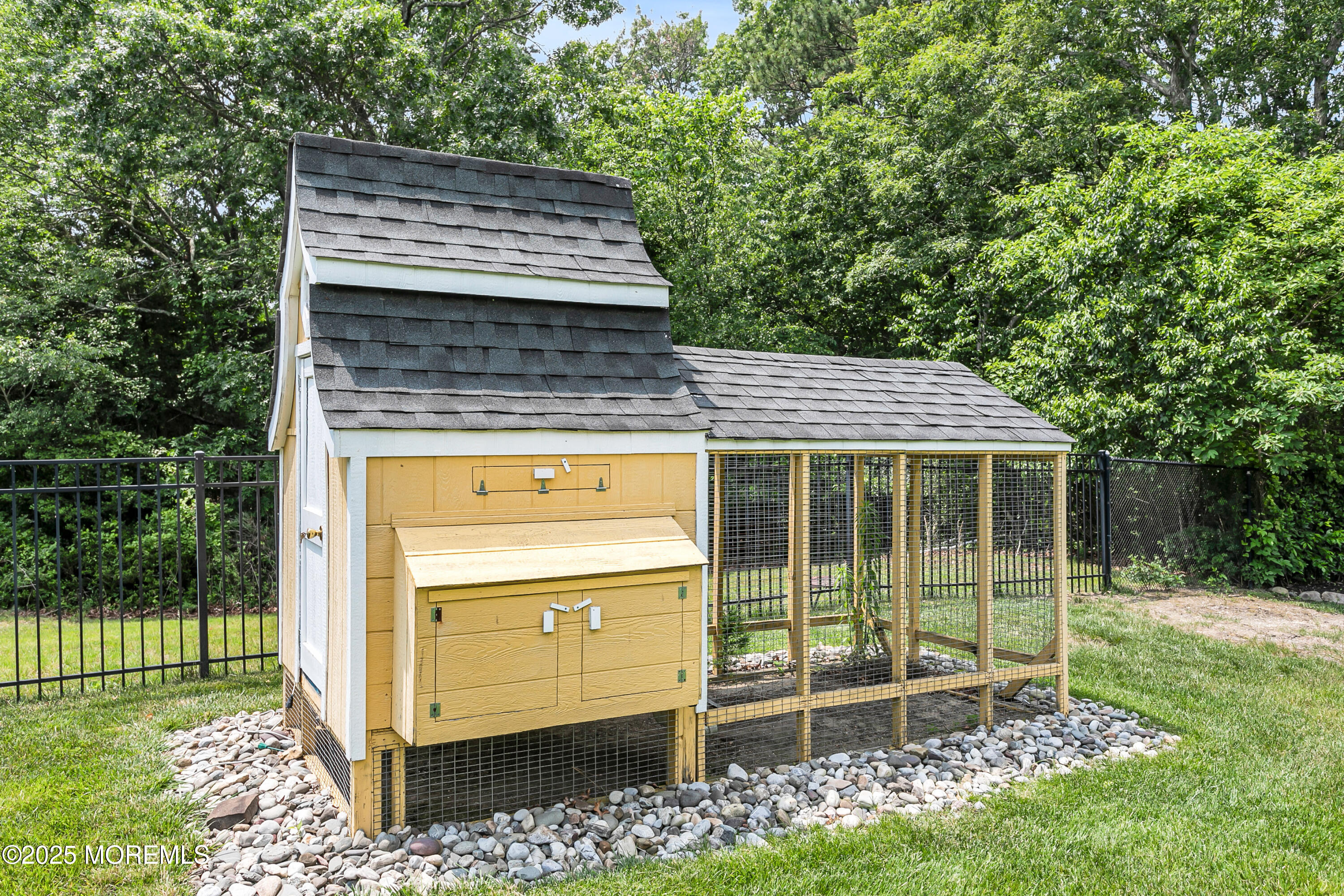 529 Woodview Road Toms River, NJ 08755 - Photo 75 of 85 a view of a house with a sink and a yard