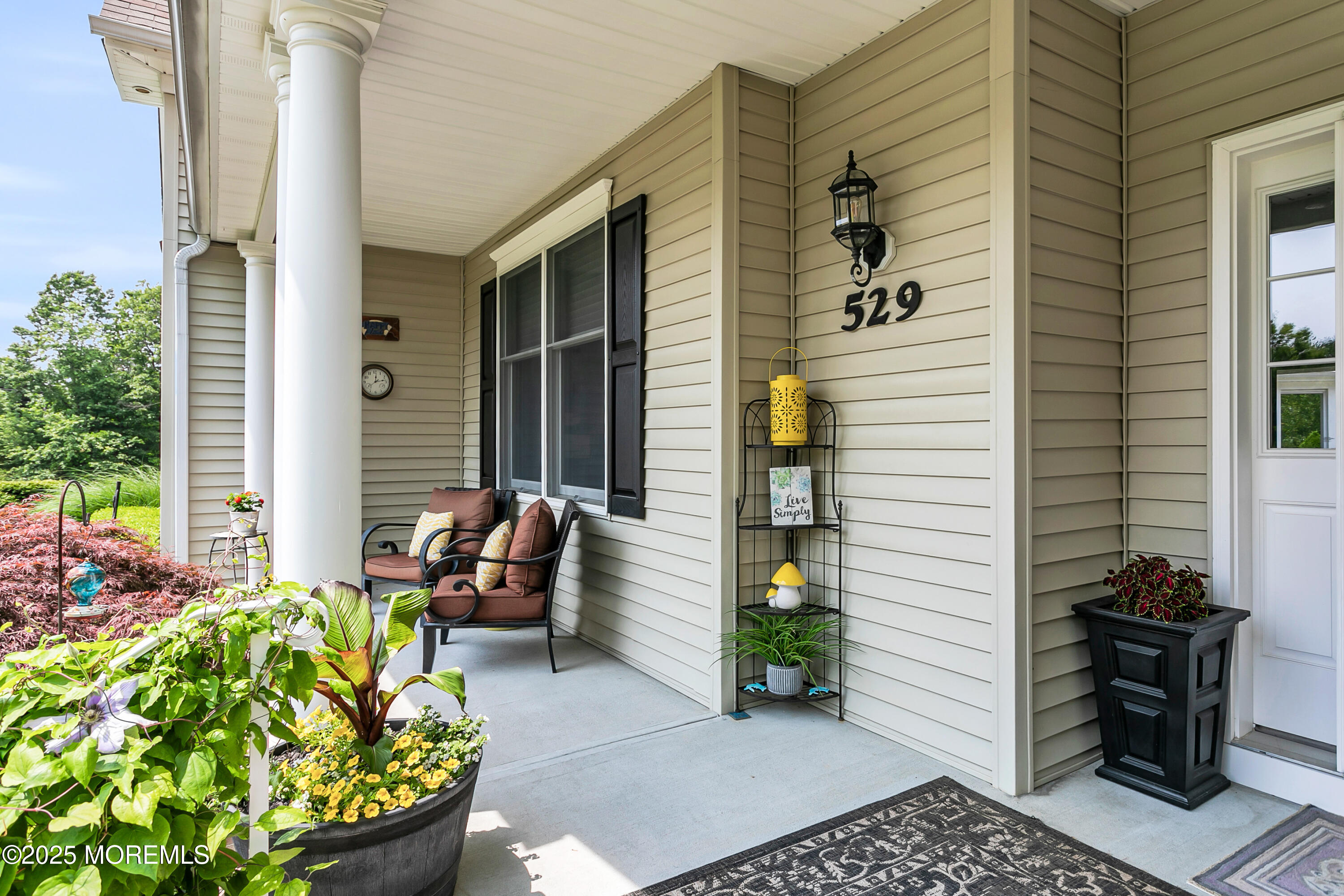 529 Woodview Road Toms River, NJ 08755 - Photo 10 of 85 a view of a patio with chair and potted plants