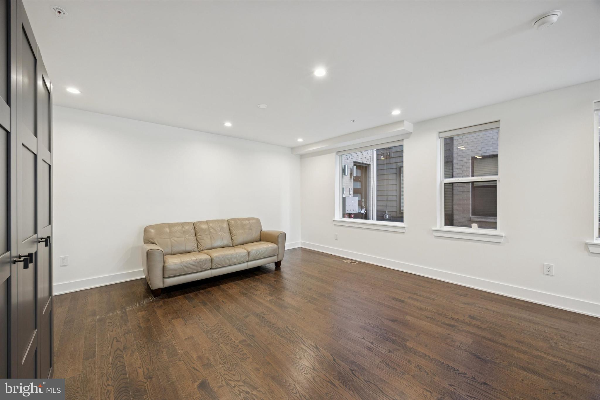1022 South 2nd Street, Unit 7 Philadelphia, PA 19147 - Photo 3 of 28 a living room with furniture and a wooden floor