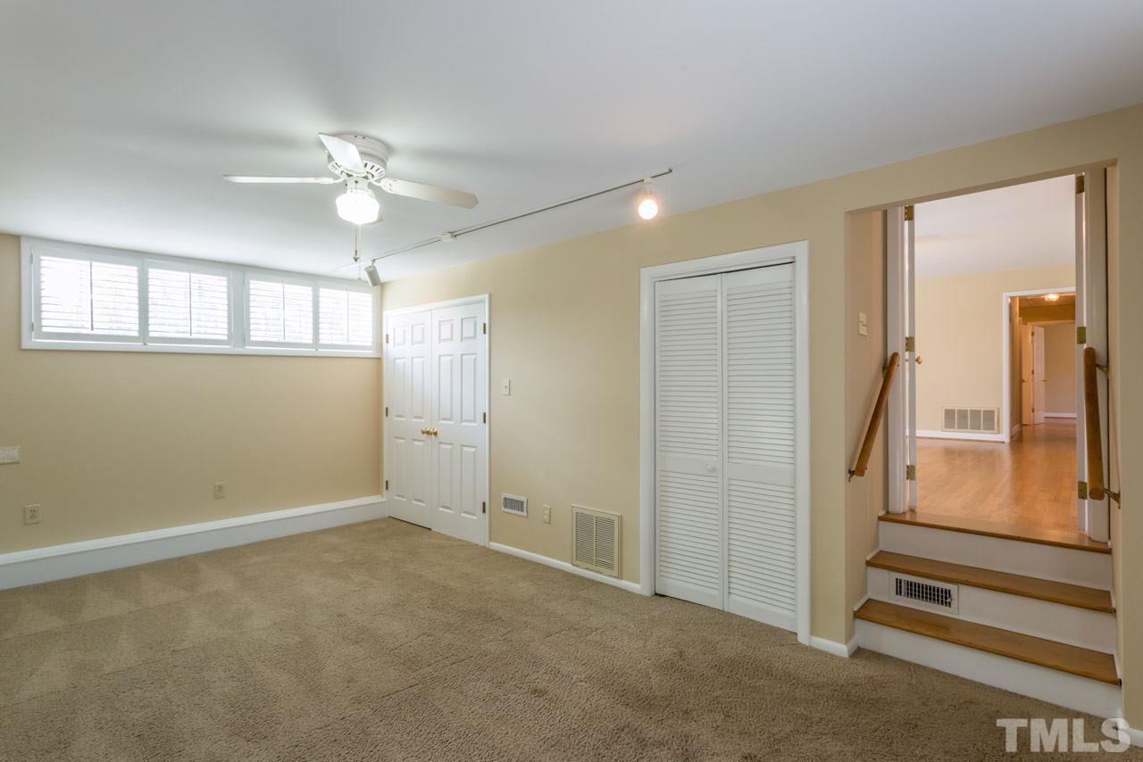 3408 Cherry Lane Raleigh, NC 27607 - Photo 16 of 25 a view of an empty room with a window