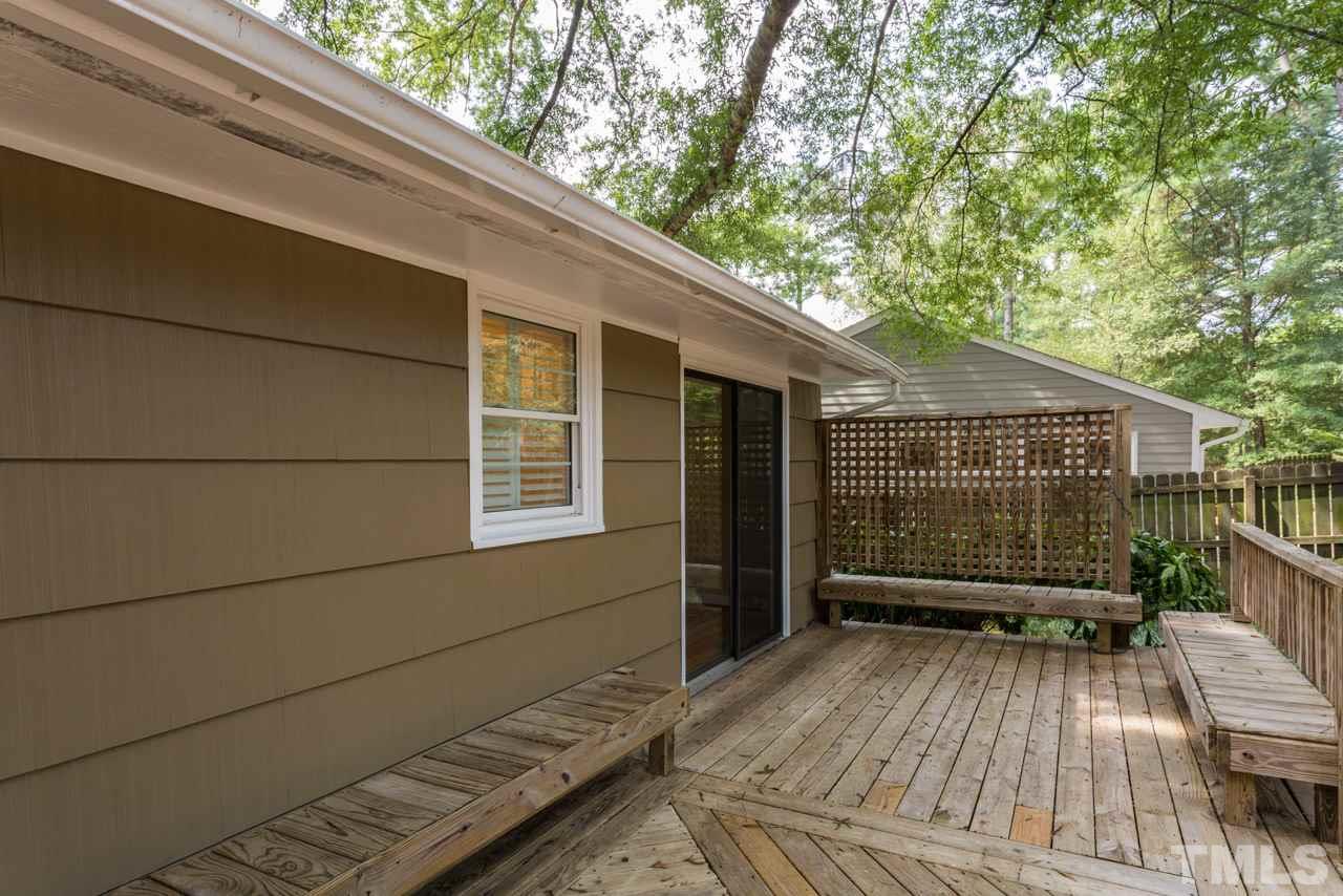3408 Cherry Lane Raleigh, NC 27607 - Photo 18 of 25 a view of backyard with a wooden deck