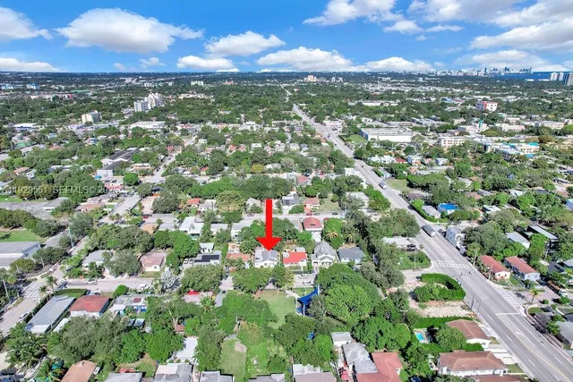 a view of city and green space