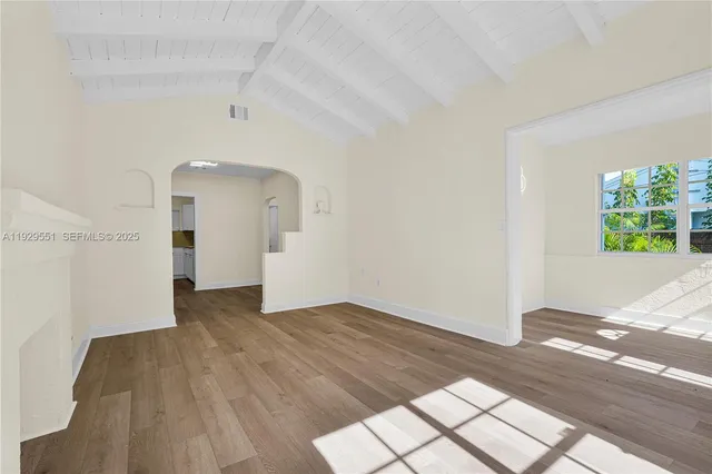 a view of an empty room and window