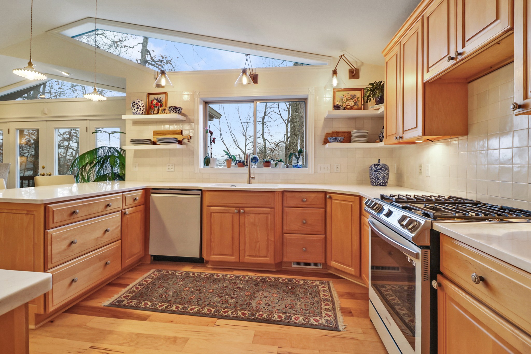 138 Rutgers Circle Crossville, TN 38558 - Photo 13 of 45 a kitchen with a stove a sink and cabinets