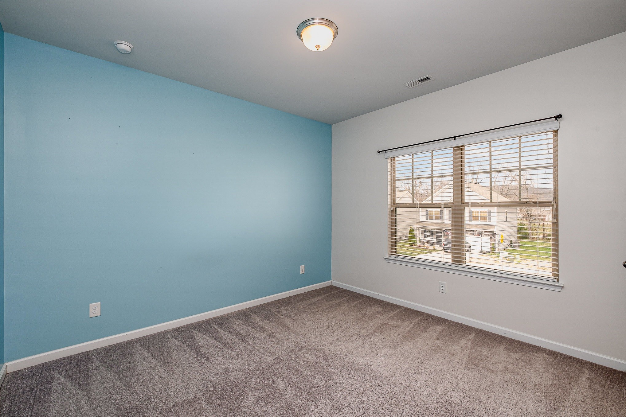 966 Carnation Drive Spring Hill, TN 37174 - Photo 4 of 17 an empty room with a window