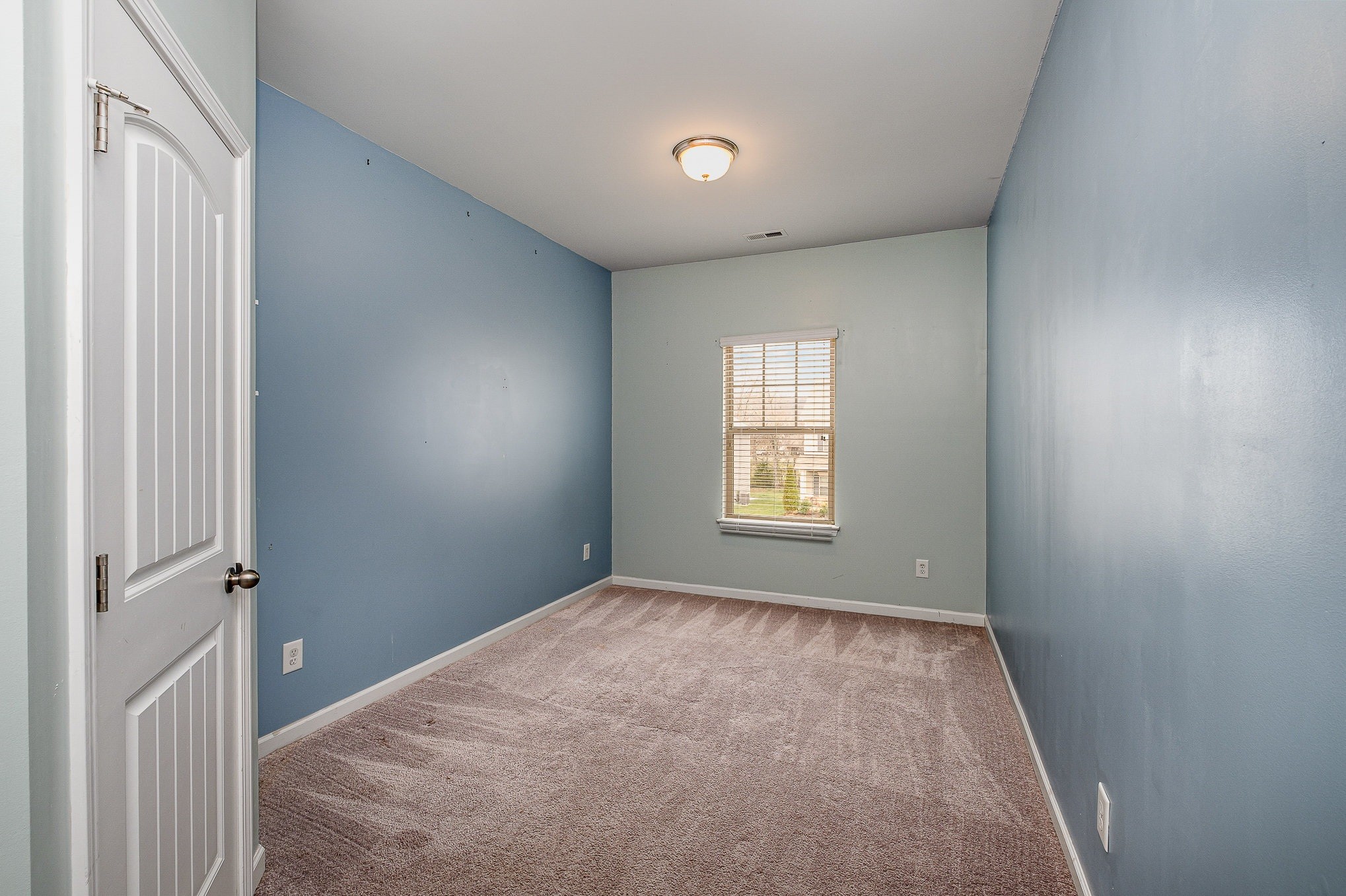966 Carnation Drive Spring Hill, TN 37174 - Photo 5 of 17 a view of an empty room with a window