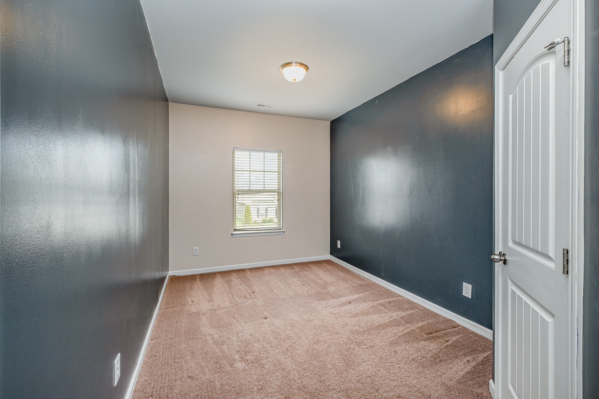 966 Carnation Drive Spring Hill, TN 37174 - Photo 6 of 17 an empty room with windows and closet