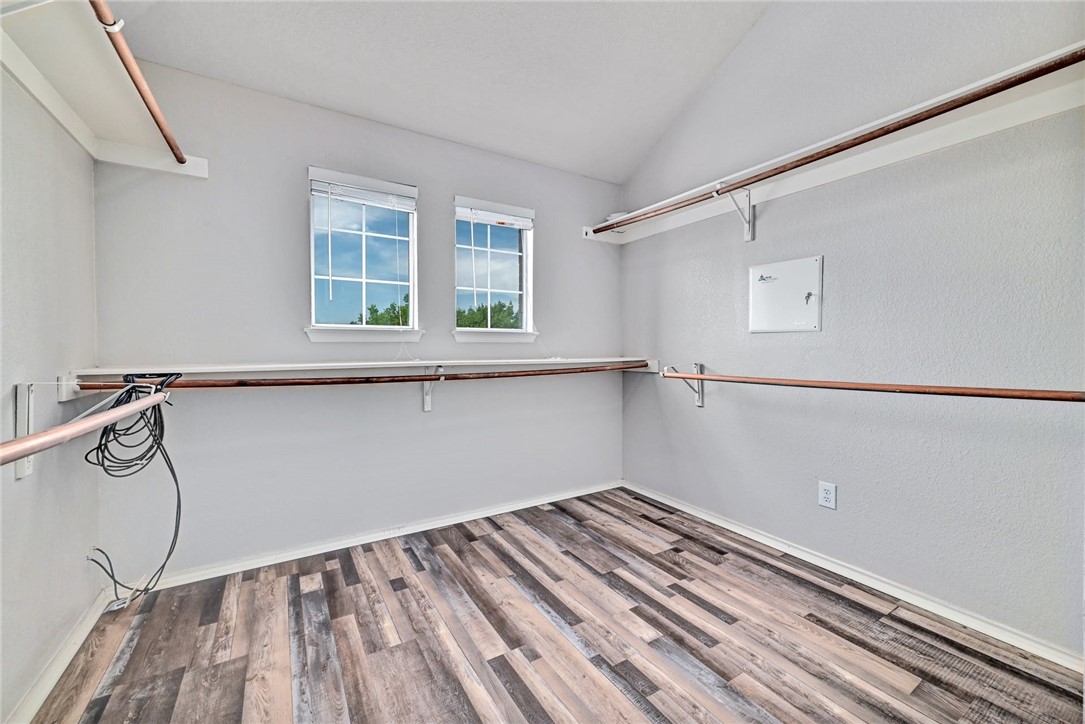 2049 Rachel Lane Round Rock, TX 78664 - Photo 23 of 36 a view of a room with wooden floor and cabinets