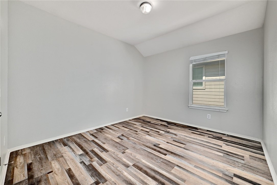2049 Rachel Lane Round Rock, TX 78664 - Photo 24 of 36 a view of a room with wooden floor and fan